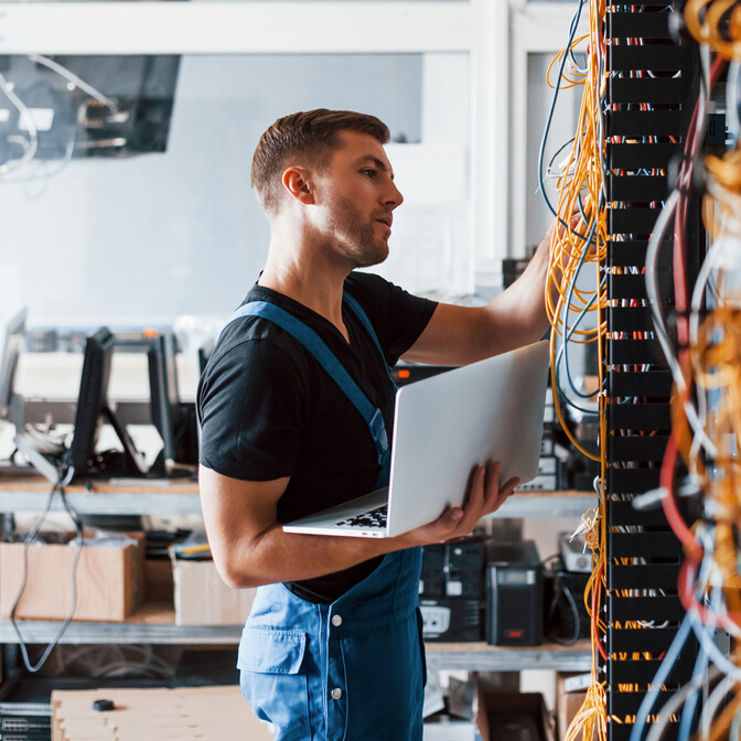 Server service server rack cabling young engineer male cables support service