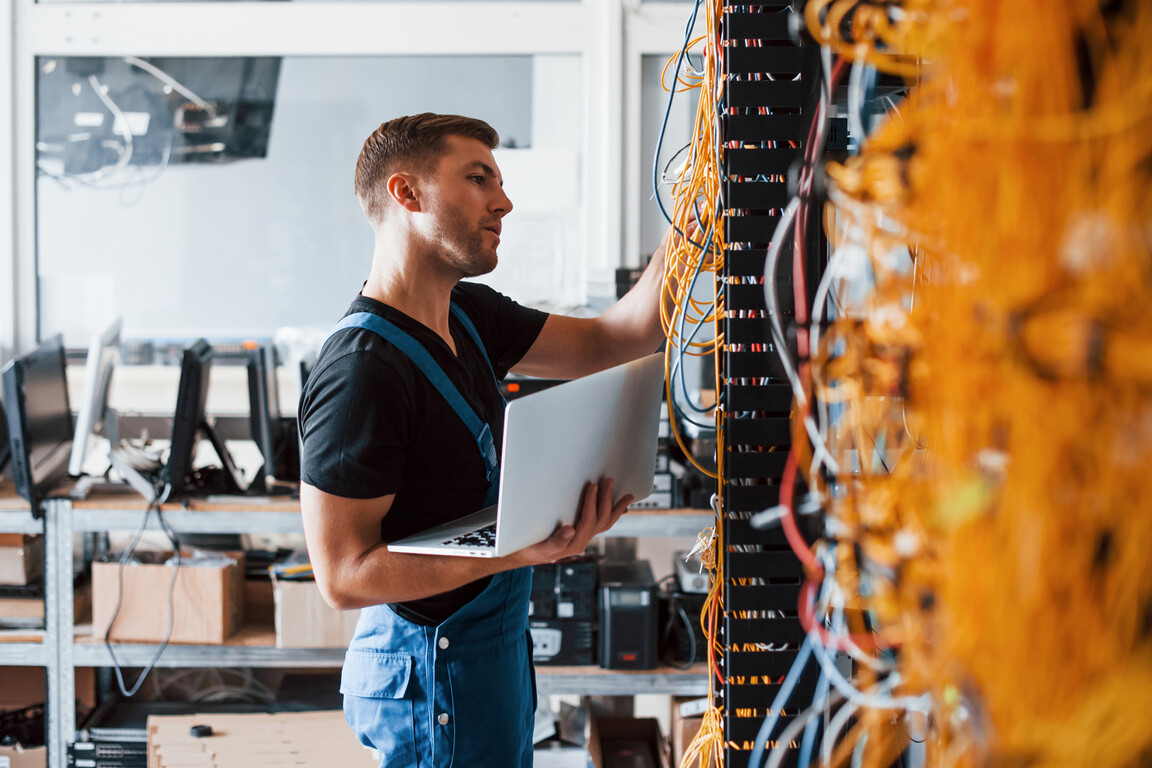 Server service server rack cabling young engineer male cables support service