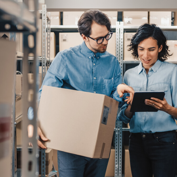 male female colleagues storage discuss devices hardware delivery