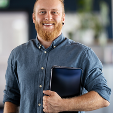 Let's elevate your IT Service offering together! young guy beard passionate IT technician engineer denim resident mobile field service lifecycle services global