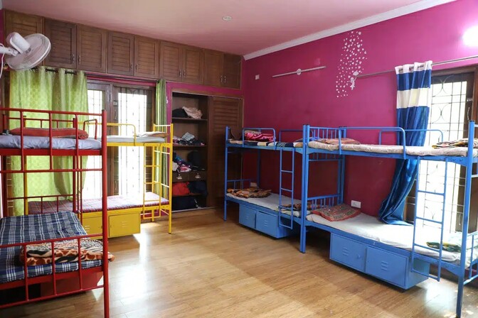 bedroom with bunk beds and colorful walls